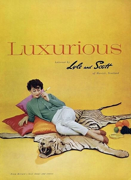 Lyle and Scott 1950s UK womens knitwear woman tiger skin rugs