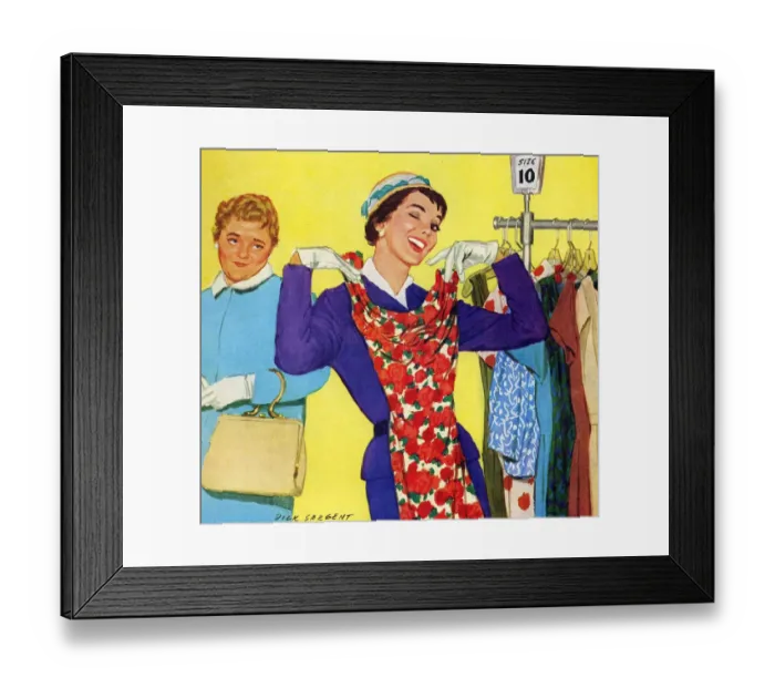 Framed Print : Trying on dresses 1950s UK woman shopping womens dresses Framed Print : Trying on dresses 1950s UK woman shopping womens dresses