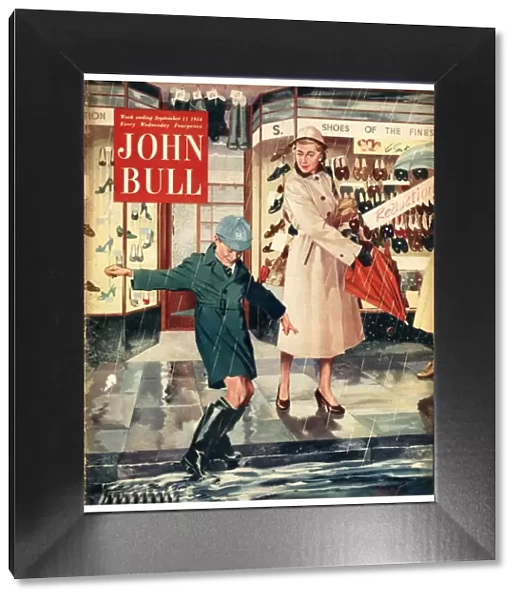 John Bull 1954 1950s UK mothers sons raining puddles umbrellas shopping wet weather