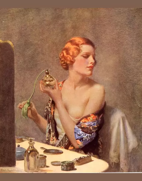 1930s UK perfume woman doing her make-up budoir putting on perfume atomisers makeup