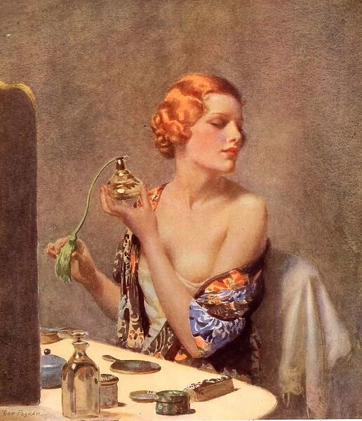 1930s UK perfume woman doing her make-up budoir putting on perfume atomisers makeup