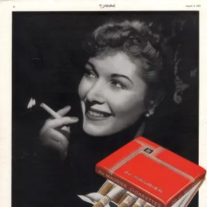 1950 1950s UK smoking cigarettes du maurier women