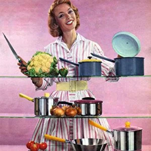 Happy Housewife in Kitchen 1960s UK pans pots housewives