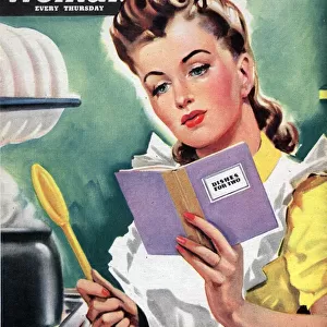 Woman 1942 1940s UK cooking women at war housewives reading recipes housewife woman