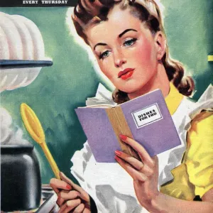 Woman 1942 1940s UK cooking women at war housewives reading recipes housewife woman