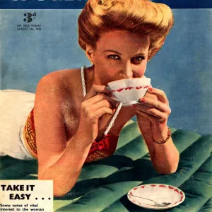 Womans Own 1953 1950s UK drinking tea relaxing