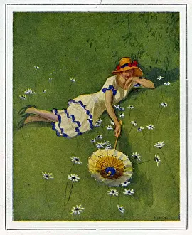 Images Dated 2008: Woman on lawn with daisies 1929 1920s France cc relaxing sunbathing umbrellas hats